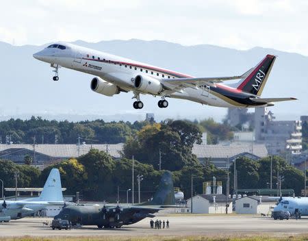 Mitsubishi Aircraft Corp's Mitsubishi Regional Jet (MRJ) takes off for a test flight at Nagoya Airfield in Toyoyama town, Aichi Prefecture, central Japan, in this photo taken by Kyodo November 11, 2015. Mandatory credit REUTERS/Kyodo