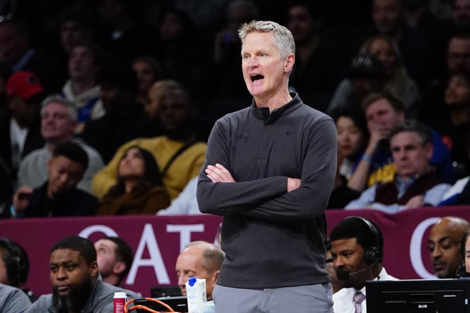 Golden State Warriors' Steve Kerr calls out to his team during the first half of an NBA basketball game against the Brooklyn Nets Wednesday, Dec. 21, 2022 in New York. (AP Photo/Frank Franklin II)