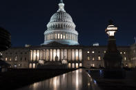 The Capitol is seen at dusk as work in the Senate is stalled on the Democrats' $1.9 trillion COVID-19 relief bill, in Washington, Friday, March 5, 2021. Senators plan to continue to vote on amendments through the night. (AP Photo/J. Scott Applewhite)