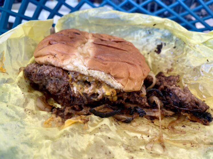 The double oxtail smash burger from The Jerk Grill in Redlands.