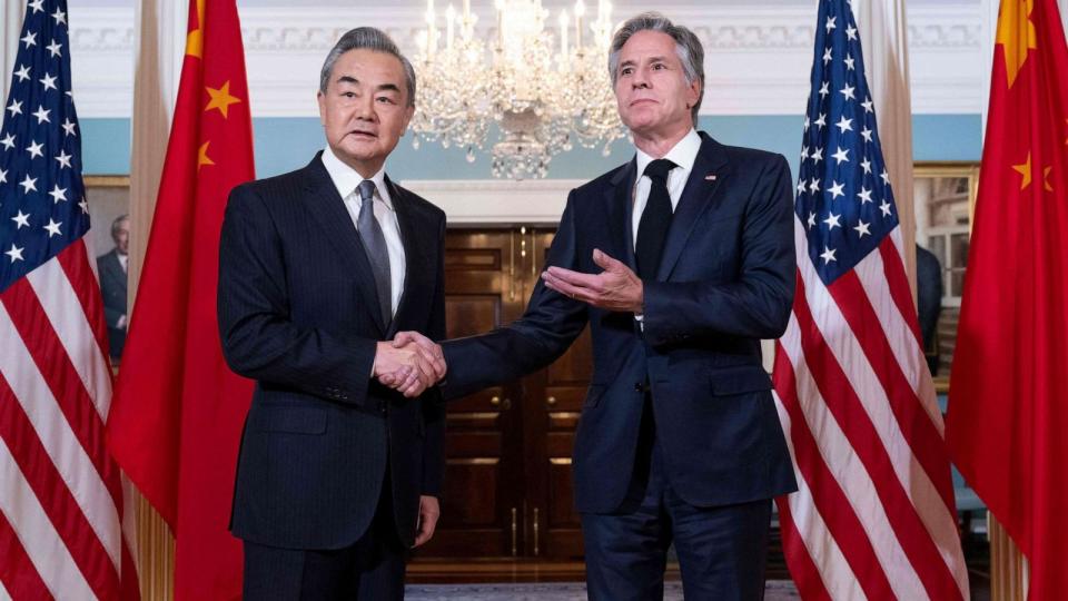 PHOTO: Secretary of State Antony Blinken shakes hands with Chinese Foreign Minister Wang Yi prior to meetings at the State Department in Washington, DC, Oct. 26, 2023. (Saul Loeb/AFP via Getty Images)