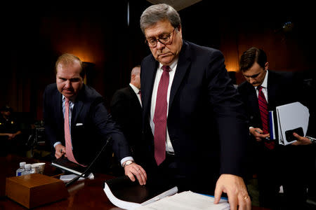 FILE PHOTO: U.S. Attorney General William Barr departs after testifying before a Senate Judiciary Committee hearing entitled "The Justice Department's Investigation of Russian Interference with the 2016 Presidential Election." on Capitol Hill in Washington, U.S., May 1, 2019. REUTERS/Aaron P. Bernstein/File Photo