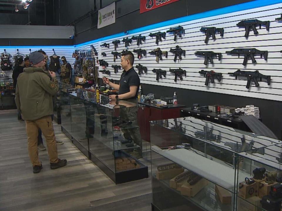 The owner of 007 Airsoft in Calgary says he's been waiting for clarity on what Bill C-21 means for his business.  (Colin Hall/CBC - image credit)