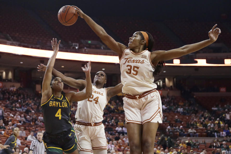 Baylor guard Te'a Cooper (4) has her shot blocked by Texas forward Charli Collier (35) during the first half of an NCAA college basketball game Friday, Jan. 31, 2020, in Austin, Texas. (AP Photo/Eric Gay)