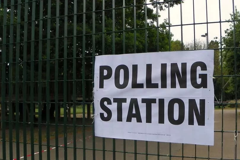 A polling station sign