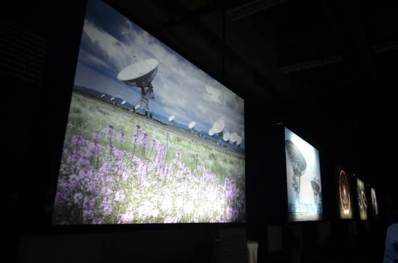 Visitors to the new "Radio Astronomy: A New Window on the Universe" exhibition in Chile's Santiago Metro will be immersed in a dark room illuminated by glowing cosmic photos.