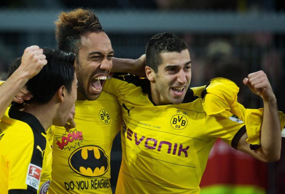 Pierre-Emerick Aubameyang, centre, and Henrikh Mkhitaryan, right, celebrate in 2015 when they enjoyed a prolific partnership for Dortmund.