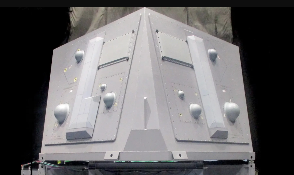 A developmental SEWIP Block III module on a test rig on the ground. <em>Northrop Grumman</em>