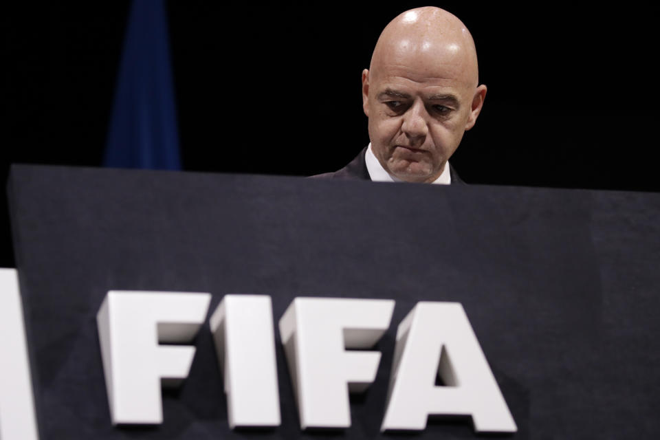 FIFA President Gianni Infantino walks on the stage before the start of the 69th FIFA congress in Paris, Wednesday, June 5, 2019. (AP Photo/Alessandra Tarantino)