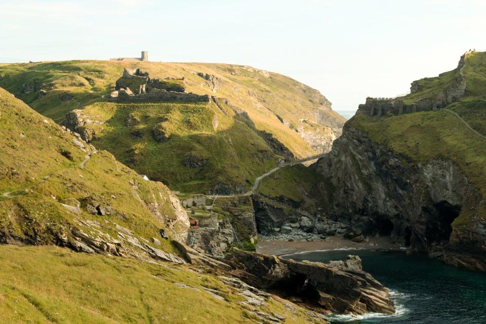 A new steel footbridge joins the two parts of Cornwall's Tintagel Castle, which is said to be the birthplace of King Arthur.