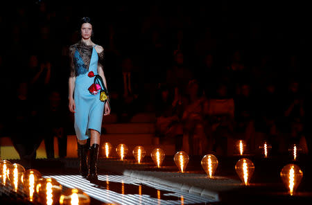 A model presents a creation by Prada during the Milan Fashion Week in Milan, Italy February 21, 2019. REUTERS/Alessandro Garofalo