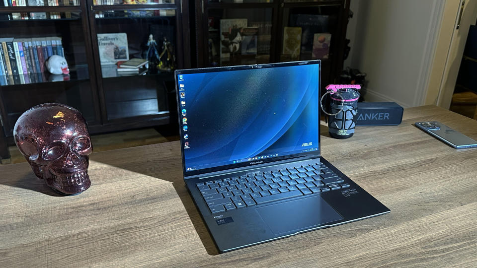 Asus Zenbook 14 OLED (Q425M) open on a desk