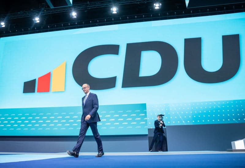 Friedrich Merz, Federal Chairman of the Christian Democratic Union (CDU), arrives for his speech during the CDU Federal Party Conference. Michael Kappeler/dpa