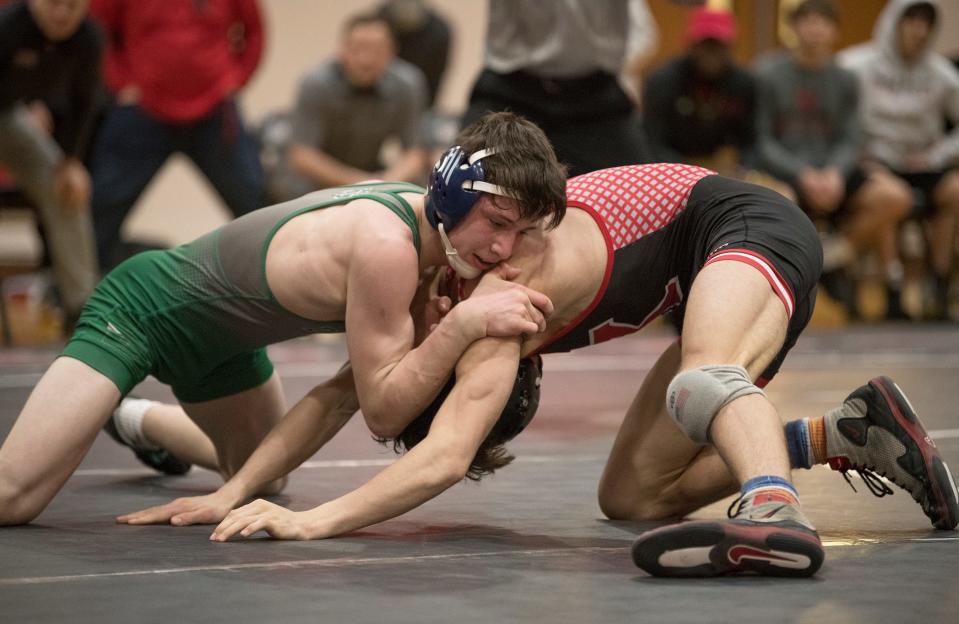 Delbarton's Cross Wasilewski controls Kingsway's Joey Miranda during the 126 lb. bout of the wrestling meet held at Kingsway Regional High School on Thursday, April 1, 2021.    Wasilewski defeated Miranda, 1-0.