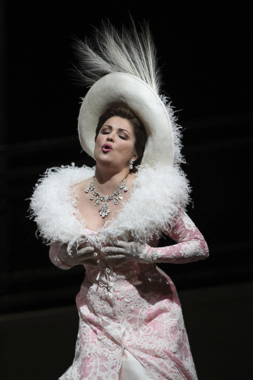 In this Friday, March 23, 2012 photo, Anna Netrebko performs the title role during the final dress rehearsal of Jules Massenet's "Manon," at the Metropolitan Opera in New York. (AP Photo/Mary Altaffer)
