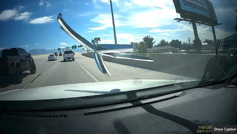 An office chair flies into the windshield of the Eaton family on I-15 in Lehi Saturday, Sept. 9, 2023.