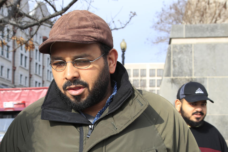 Hossein Hashemi, son of Marizeh Hashemi, an American-born anchor for Iran's state television, leaves federal court in Washington, Friday, Jan. 18, 2019. According to partially unsealed federal court documents, Hashemi, who has been jailed in the U.S., has not been accused of any crime. She has been detained as a material witness, though it's unclear for which case. (AP Photo/Manuel Balce Ceneta)