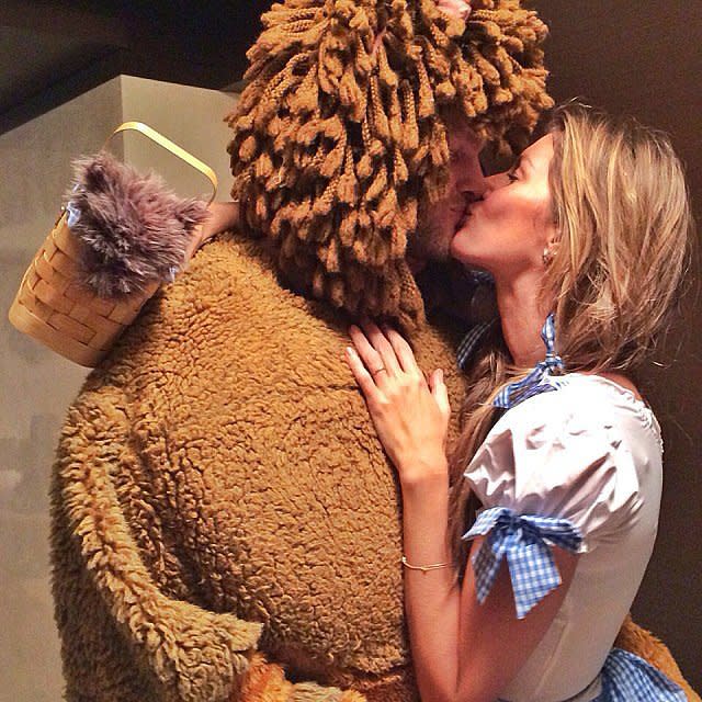 Gisele Bundchen and Tom Brady as Dorothy and the lion. 