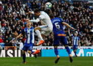 Soccer Football - La Liga Santander - Real Madrid vs Deportivo Alaves - Santiago Bernabeu, Madrid, Spain - February 24, 2018 Real Madrid’s Cristiano Ronaldo in action with Alaves’ Victor Laguardia REUTERS/Juan Medina