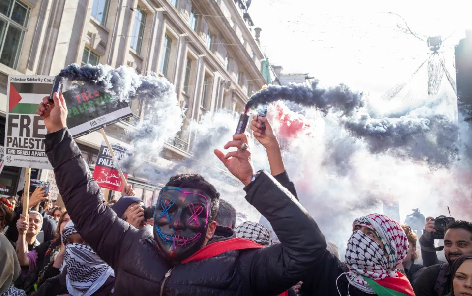 Masks are worn at pro-Palestinian protests demonstrating against the current Israeli military operation in Gaza