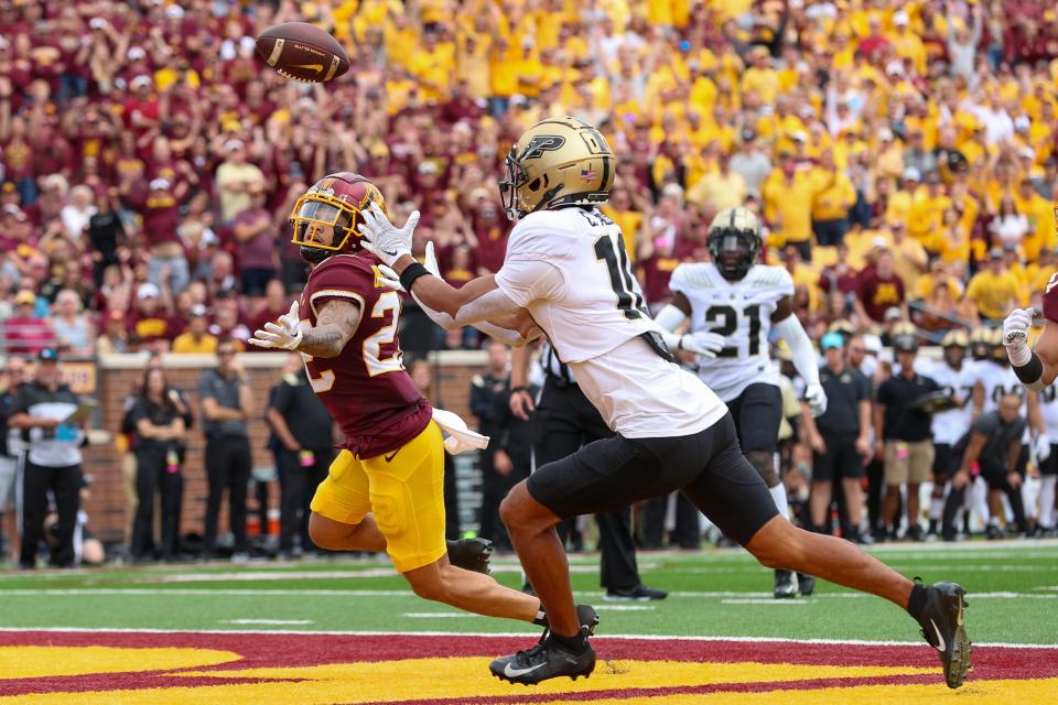 Oct 1, 2022; Minneapolis, Minnesota, USA; Purdue Boilermakers safety Cam Allen (10) intercepts a pass against the Minnesota Golden Gophers during the second quarter at Huntington Bank Stadium.