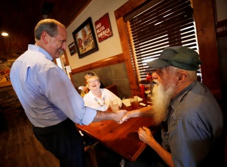 Dan Bishop, Republican candidate in the special election for North Carolina's 9th Congressional District, speaks to prospective voters at a campaign stop in a restaurant, in Indian Trail, North Carolina