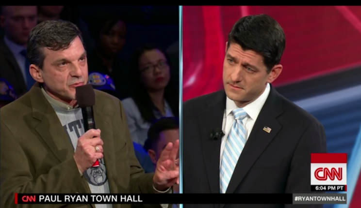 Jeff Jeans, left, who is a cancer survivor, questions House Speaker Paul Ryan about the Affordable Care Act at a town hall event at George Washington University in Washington, D.C. (Photo: CNN)