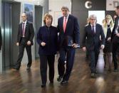 U.S. Secretary of State John Kerry (R) walks with European Union foreign policy chief Catherine Ashton before their meeting with Iranian Foreign Minister Mohammad Javad Zarif (not pictured) in Geneva, November 8, 2013. REUTERS/Jason Reed