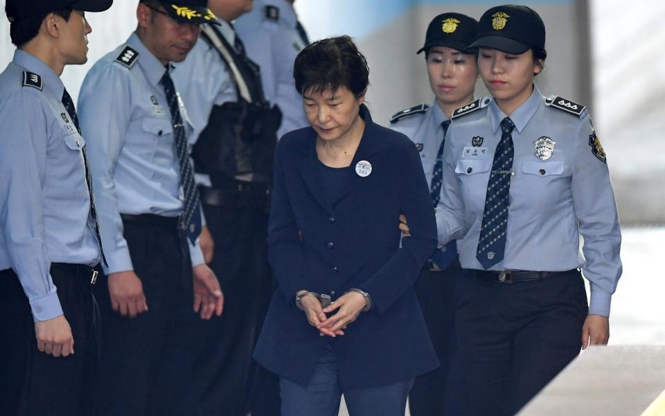 South Korea's ousted leader Park Geun-hye arrives at the Seoul Central District Court, for her trial over the corruption scandal that led to her downfall, May 25, 2017 - Credit: REUTERS