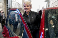 Energy Secretary Jennifer Granholm gets into the passenger seat after test driving a Ford F-150 Lighting all electric vehicle during a visit to the Washington Auto Show in Washington, Wednesday, Jan. 25, 2023. (AP Photo/Andrew Harnik)