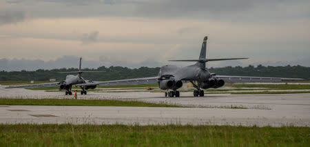 Two U.S. Air Force B-1B Lancers assigned to the 37th Expeditionary Bomb Squadron, taxi before take off to fly bilateral missions with Japanese and South Korea Air Force jets in the vicinity of the Sea of Japan, from Andersen Air Force Base, Guam, October 10, 2017. Staff Sgt. Joshua Smoot/U.S. Air Force/Handout via REUTERS