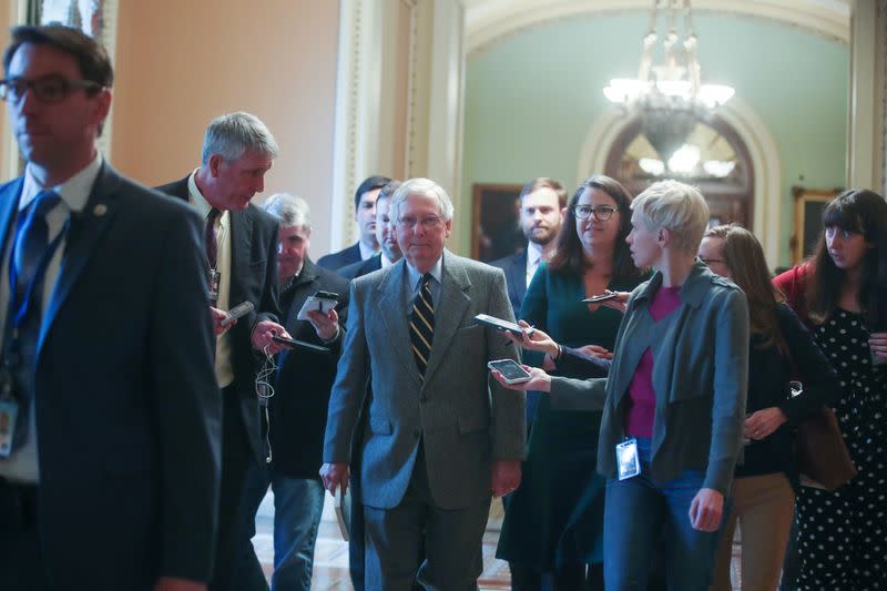 U.S. Senate Majority Leader McConnell speaks to reporters as he departs the Senate floor in the U.S. Capitol in Washington