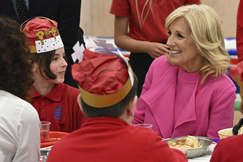 US First Lady Jill Biden reacts as she meets pupils during a visit at the Charles Dickens Primary School in London, Friday May 5, 2023. (Oli Scarff/Pool Photo via AP)