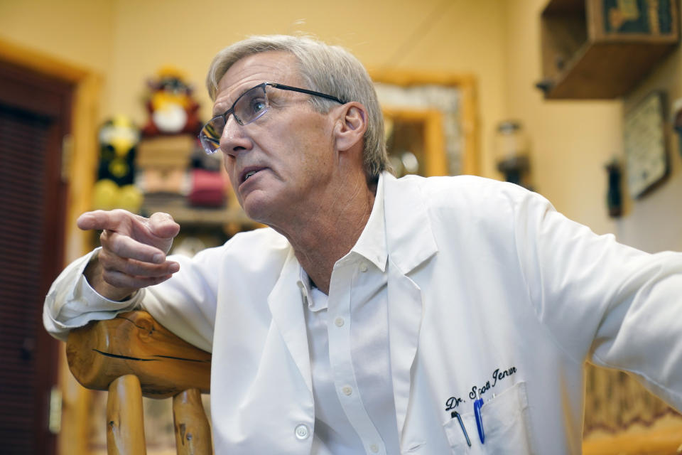 Dr. Scott Jensen, shown at his Watertown, Minn., clinic on Sept. 22, 2021, is a family physician now running for governor. He's become the frontrunner for the GOP nomination on a platform of vaccine skepticism and opposition to the restrictions that Democratic Gov. Tim Walz and President Joe Biden have used to manage the pandemic. AP Photo/Jim Mone)