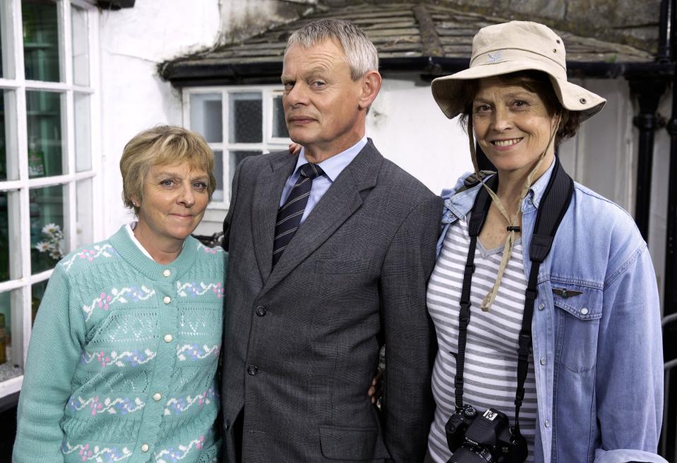 Sekina Cadell as Mrs Tishell, Martin Clunes (Doc Martin) and Sigourney Weaver in Doc Martin. (Shutterstock)