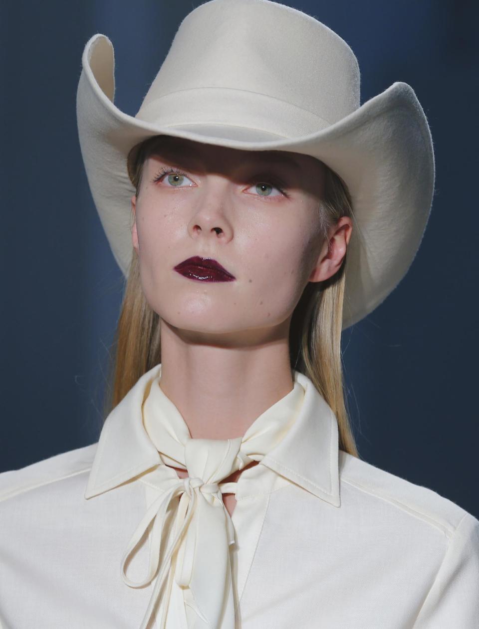 A model wears a creation by Belgian born fashion designer Veronique Branquinho as part of the Ready to wear Fall/Winter 2013/2014 fashion collection presented in Paris, Tuesday, Feb. 26 2013. (AP Photo/ Jacques Brinon)