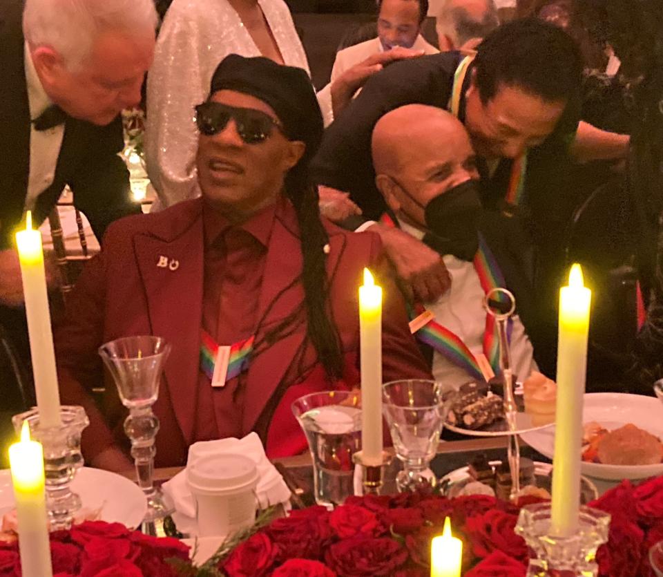 Stevie Wonder, Berry Gordy and Smokey Robinson attend the post-gala dinner at the Kennedy Center Honors on Sunday, Dec. 5, 2021.