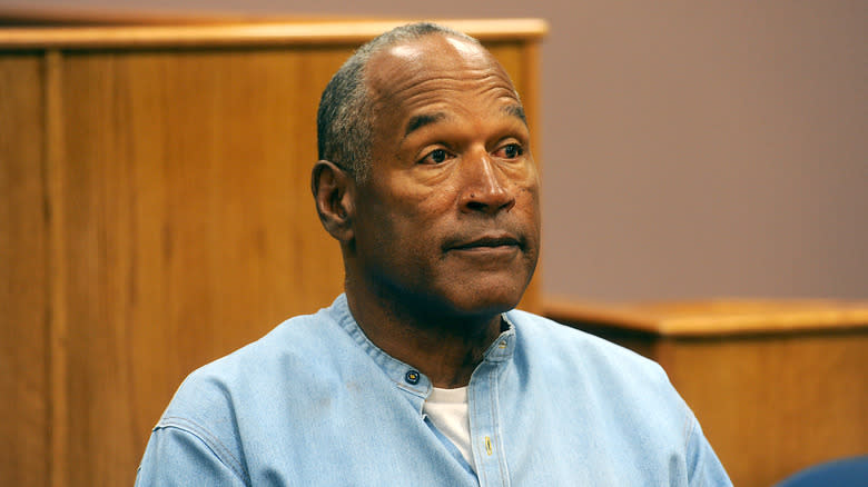 O.J. Simpson in blue shirt