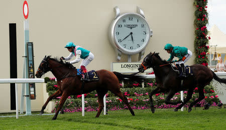 Horse Racing - Royal Ascot - Ascot Racecourse, Ascot, Britain - June 19, 2018 Monarchs Glen ridden by Frankie Dettori in action as he wins the 5.35 Wolferton Stakes Action Images via Reuters/Andrew Boyers