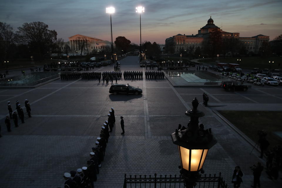 The hearse carrying the casket of former President George H.W. Bush arrives at the Capitol, Monday, Dec. 3, 2018 in Washington. (Win McNamee/Pool via AP)