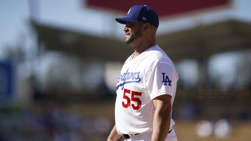 Los Angeles Dodgers first baseman Albert Pujols stands at first base during a baseball game against the Colorado Rockies Sunday, Aug. 29, 2021, in Los Angeles. (AP Photo/Ashley Landis)