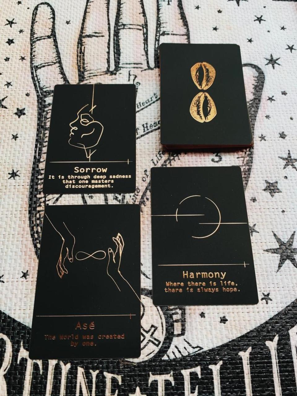 <p><strong>Akamara Tarot</strong></p><p>akamaratarot.com</p><p><strong>$65.00</strong></p><p><a href="https://akamaratarot.com/products/the-okana-oracle-deck" rel="nofollow noopener" target="_blank" data-ylk="slk:Shop Now;elm:context_link;itc:0;sec:content-canvas" class="link ">Shop Now</a></p><p>Created by Lolu, a 9th generation clairvoyant and practitioner, the Okana Oracle is, <a href="https://akamaratarot.com/" rel="nofollow noopener" target="_blank" data-ylk="slk:as Lolu puts it;elm:context_link;itc:0;sec:content-canvas" class="link ">as Lolu puts it</a>, "homage, collective admired portrayal, and gift of the divinity and variety in the spiritualities that make up the African Diaspora; from Nigeria to Cuba, the Carribean (West indies) to Haiti and African America to the Aboriginal Culture. I wanted a deck we could SEE ourselves in, from my Iyalawos to my Santeras, Sufis, Mambos, to the Voudouissants, Hoodoos any and everyone in between."</p>