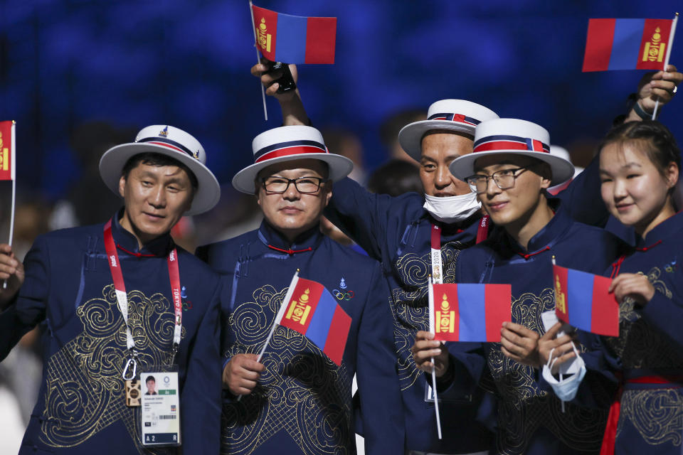 TOKYO, JAPAN - JULY 23: Athletes from Team Mongolia look on during the Opening Ceremony of the Tokyo 2020 Olympic Games at Olympic Stadium on July 23, 2021 in Tokyo, Japan. (Photo by Jamie Squire/Getty Images)