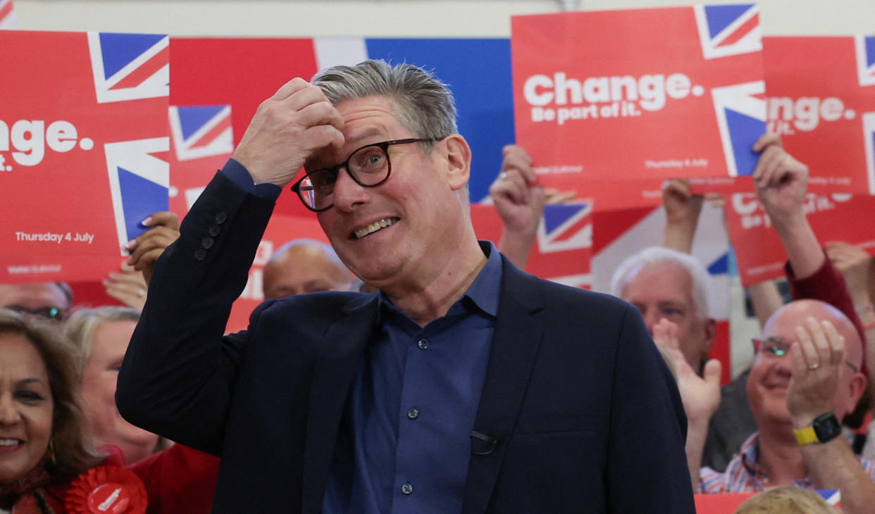 British opposition Labour Party leader Keir Starmer and Labour candidate Christopher Bloore attend a Labour general election campaign event, in Redditch, Britain July 3, 2024. REUTERS/Phil Noble