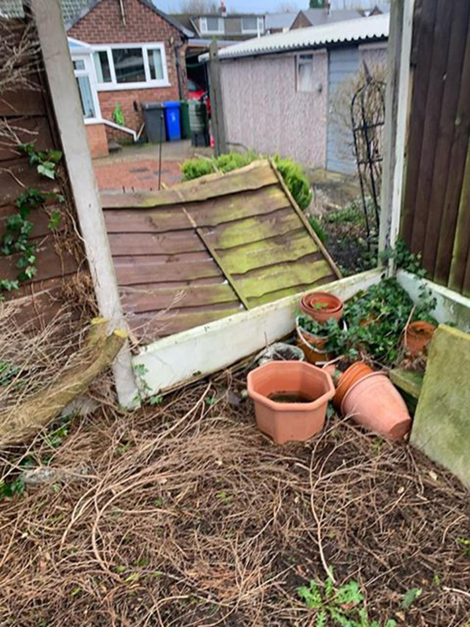 The handymen have been fixing fences in Manchester (Picture: Mercury)