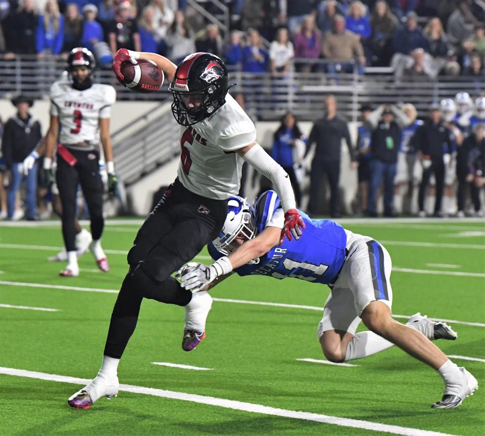 against .. during the state quarterfinals in Denton on Friday, December 2, 2022.