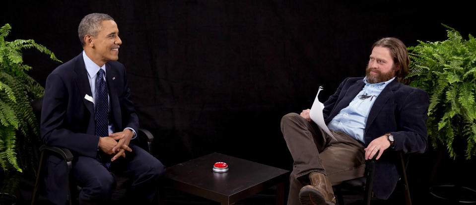 This image from video released by Funny Or Die shows President Obama, left, with actor-comedian Zach Galifianakis during an appearance on "Between Two Ferns," the digital short with a laser focus on reaching people aged 18 to 34. The president urged young people to sign up for the new health care plan through an appearance posted Tuesday, March 11, 2014, on the comic website Funny or Die, bypassing TV talk show titans like Jimmy Fallon or Jimmy Kimmel for an online audience. (AP Photo/Funny Or Die)