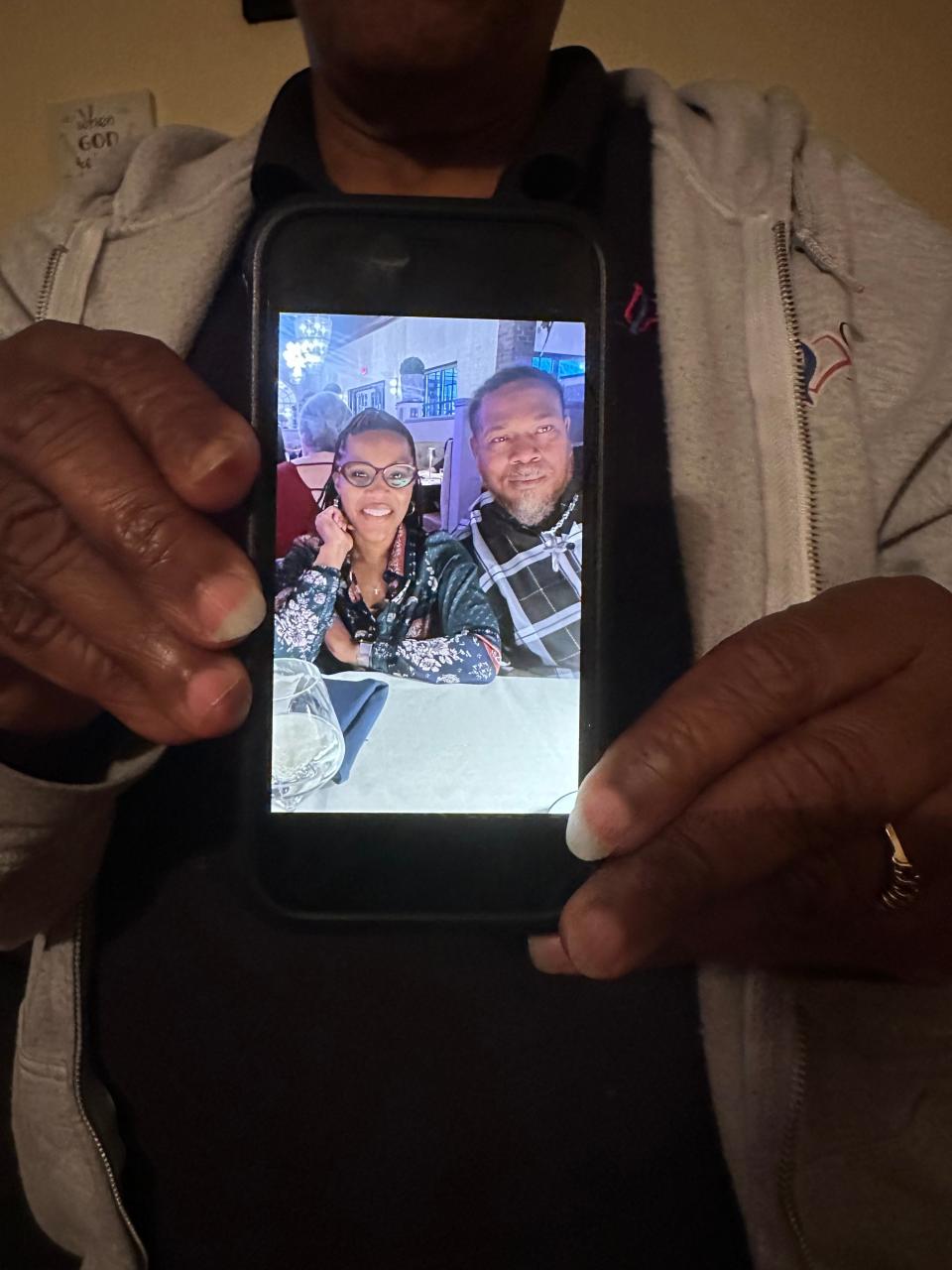 Phyllis Sims shows a picture of her son, Timothy Ruff, who was shot and killed in March.