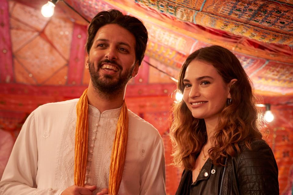 Shazad Latif and Lily James in WHAT'S LOVE GOT TO DO WITH IT (Photo by Robert Viglasky / 2022 STUDIOCANAL SAS and Shout! Studios)