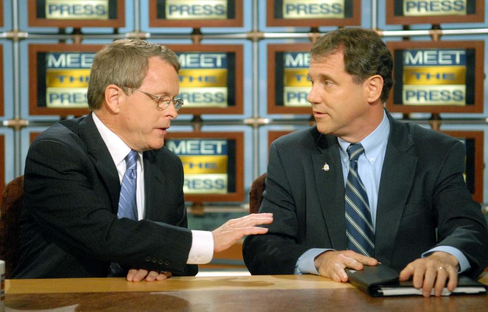 Mike DeWine (left) took part in a debate with his Democratic challenger Sherrod Brown in the U.S. Senate race in 2006. Kevin Wolf/AP
